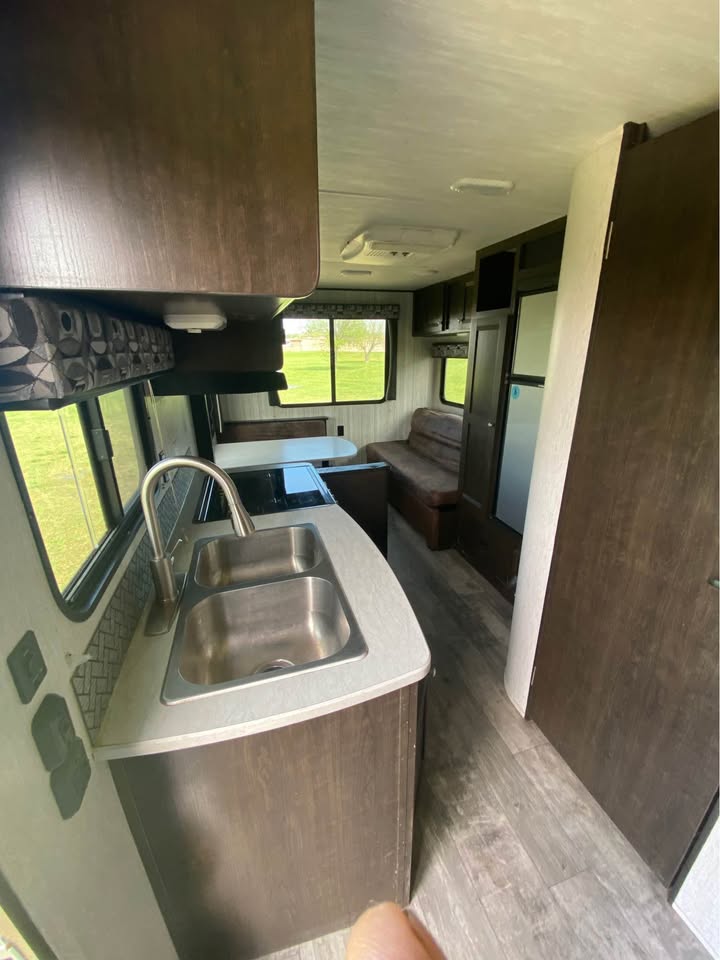 pristine Used 2017 Heartland RV Pioneer RD210 ready for delivery - gallery image 6 from Glenpool Camper Sales Glenpool OK